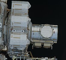 Quest Joint Airlock Module Quest airlock exterior - STS-127.jpg