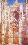 Картина «Руанский собор, Портал, Солнце», изображающая залитый светом портал собора