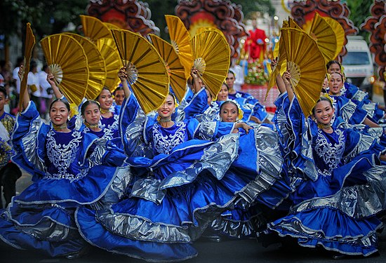 Spanish-inspired festival costumes. Photograph: HerbertKikoy (CC BY-SA 4.0)