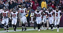 Ryan and his teammates in a game against the Washington Redskins Atlanta Falcons (45674483812).jpg