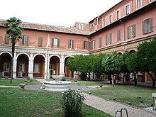 Cloister of the Angelicum Cloister of the Pontifical University of St. Thomas Aquinas.JPG