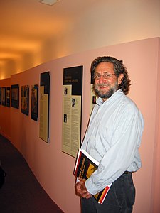 Exhibition designer Bill Chayes at Berkeley Hillel, the first-ever venue for The Arthur Szyk Society's traveling exhibition (2002)