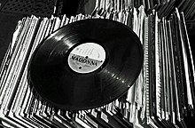 With over 300 million record sales worldwide, she is certified as the best-selling woman in music history by Guinness World Records. Madonna vinyl (cropped).jpg