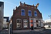 Winkel met woning