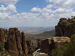 Soon after one leaves Graaff-Reinet a road turns sharply to the left from the main road to Middelburg. It passes between the mountain and the Van Rhyneveld Pass Dam and goes in a north-westerly direction to Murraysburg and Richmond. Opposite the dam another.[clarification needed]