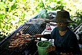 Woman selling foods at Taling Chan market