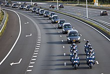 Convoy of 40 hearses heading to Hilversum in the Netherlands, while other traffic stopped Convoy of MH-17 victims on the highway.jpg