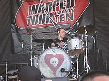 Grant performing with Alkaline Trio on the 2010 Warped Tour