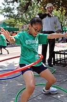 Young girl hula hoops at a Play Streets HolaHoops Play Streets 2010.JPG