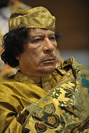 English: Muammar al-Gaddafi at the 12th AU sum...