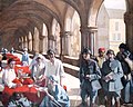 « The Scottish Women's Hospital : In The Cloister of the Abbaye at Royaumont. Dr Frances Ivens inspecting a French patient », peint par Norah Neilson Gray.