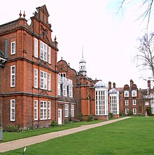 Picture of the front and grounds of Newnham College, Cambridge