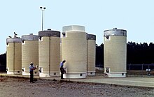 Dry cask storage vessels storing spent nuclear fuel assemblies Nuclear dry storage.jpg