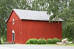 Pöytis sockenmagasin och Lizelius-monumentet