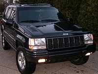 A Deep Slate 1998 Grand Cherokee 5.9L (Note hood louvers and mesh grille inserts)