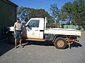 Department of Conservation and Land Management's Ranger in summer uniform with 4WD at Kalbarri National Park ranger station, October 2005.