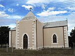 The church is a simple T-shaped stone building with a symmetrical facade and roof of sink. The church In 1914 the various congregations of the 'Kerk onder die Kruis' amalgamated and joined t Type of site: Church Previous use: Religious : Church. Current use: Religious : Church. In 1897 a number of members of the NG Church broke away to form their own congregation. The land was