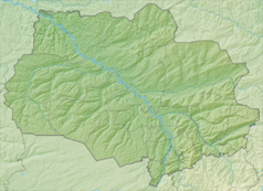 Mapa konturowa obwodu tomskiego, na dole nieco na prawo znajduje się punkt z opisem „Tomsk”