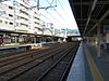 The tracks and platforms at Rokkō Station in 2014