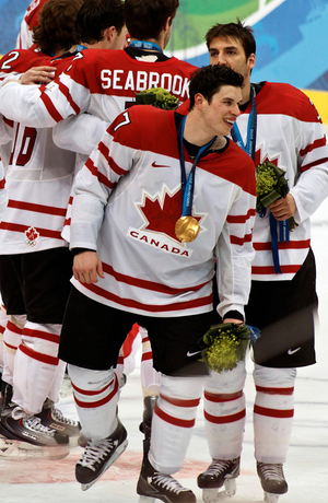 Canada forward Sidney Crosby celebrates with t...