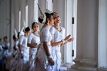 Female dancers in traditional Kandyan dress Two Women in Traditional Kandyan Dress Laugh While Waiting as Secretary Kerry Meets With Sri Lankan Foreign Minister Samaraweera (16720359423).jpg