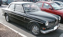 The Amazon was noted for its safety features: a padded dashboard, front and rear seat belts, and a laminated windshield. 1966 Volvo 122 two-door in Black, front right.jpg