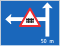 4.55 Announcement of a branching road with a dangerous situation or restrictions (here: side road to the left 50 m ahead with the warning of the presence of a gated level crossing right after the turn)