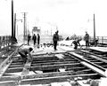 Workers on the bridge after the fire