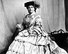The resolute Kate Cranston around 1903, dressed in the style of the 1850s
