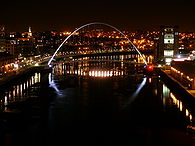 The Gateshead Millennium Bridge at night.