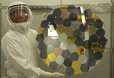 A Genesis collector array in the clean lab at Johnson Space Center. The hexagons consist of a variety of ultra-pure, semiconductor-grade wafers, including silicon, corundum, gold on sapphire, diamond-like carbon films,[15] and other materials.[16]