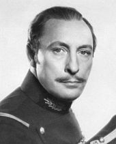 A profile of Lionel Atwill's featuring him in a military form and having a moustache.