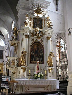 Altar of the Holy Name of Jesus, with the IHS monogram at the top, Lublin, Poland. Lublin,op,ihs,chapel.jpg