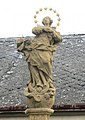 Vrchol sloupu se sochou Panny Marie