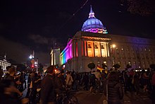 San Francisco City Hall lit in LGBT rainbow colors in honor to the victims of the shooting San Francisco vigil for Orlando - 5.jpg