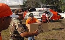 USAID Packages are delivered by United States Coast Guard personnel USAID.jpg