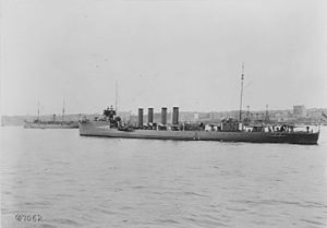 USS Jouett (DD-41) anchored in the Hudson River off New York City, during the October 1912 Naval Review. USS Rhode Island (BB-17) is in the left background.