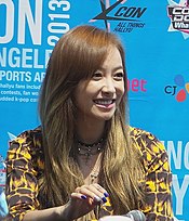 Victoria Song smiling and looking slightly to the right at the KCON Los Angeles in 2013