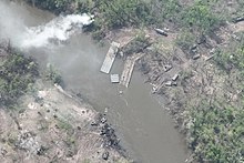 Destroyed Russian pontoon bridge and vehicles near Bilohorivka during the battle of the Siverskyi Donets. Forsuvannia Sivers'kogo Dontsia.jpg