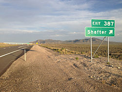 2014-06-10 19 24 10 Sign for Exit 387 along eastbound Interstate 80 and southbound Alternate U.S. Route 93 near Shafter, Nevada.JPG