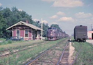 CGW 111-C (F3A) westbound freight passing the Elmhurst, Illinois station on August 14, 1962 (21820237513).jpg