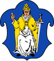 Markt Schliersee In Blau auf goldenem Faltstuhl sitzend der heilige Papst Sixtus mit goldener Tiara, goldenem Mantel und silbernem Gewand, die Rechte segnend erhoben, in der Linken ein silbernes Schwert mit goldenem Griff.