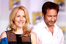 The revival features Gillian Anderson (left) and David Duchovny (right, pictured in 2013) reprising their roles as Dana Scully and Fox Mulder, respectively. Gillian Anderson & David Duchovny (9344570889).jpg