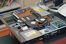 The inside and front of a Dell PowerEdge web server, a computer designed for rack mounting Inside and Rear of Webserver.jpg