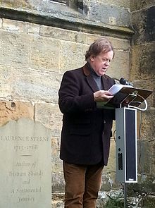 Jonathan Meades reading on Sterne's grave 2012.jpg