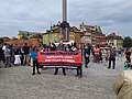 Baner „Solidarni z imigrantami”