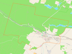 Mapa konturowa Kaczor, blisko prawej krawiędzi znajduje się owalna plamka nieco zaostrzona i wystająca na lewo w swoim dolnym rogu z opisem „Kopcze”