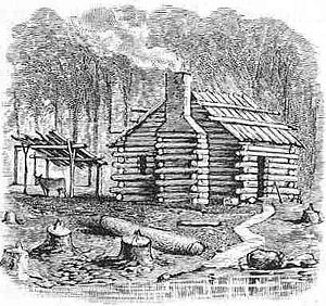 English: A settler's log cabin