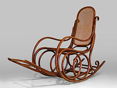 Rocking-chair à dossier de rotin