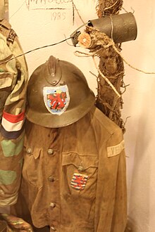 Improvised Luxembourg resistance uniforms, dating to 1944 or 1945, in the collection of the National Museum of Military History. National Museum of Military History - Luxembourg resistance.jpg